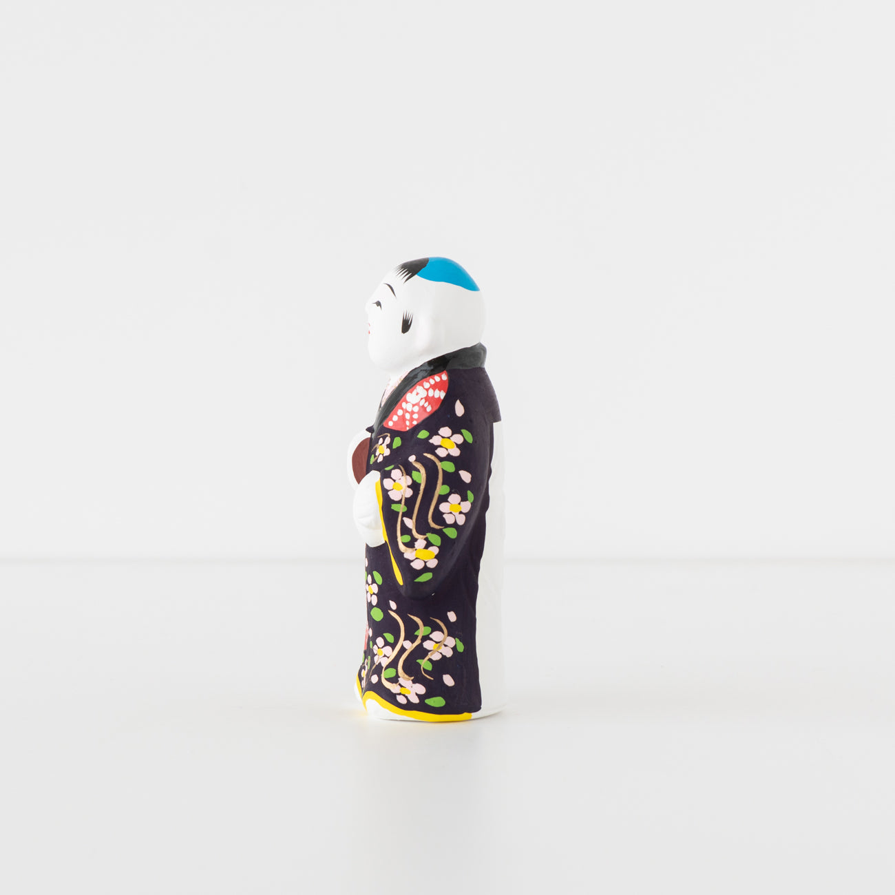 伏見人形 饅頭喰い（中） | 京都の伝統工芸品の通販サイト – MOCAD