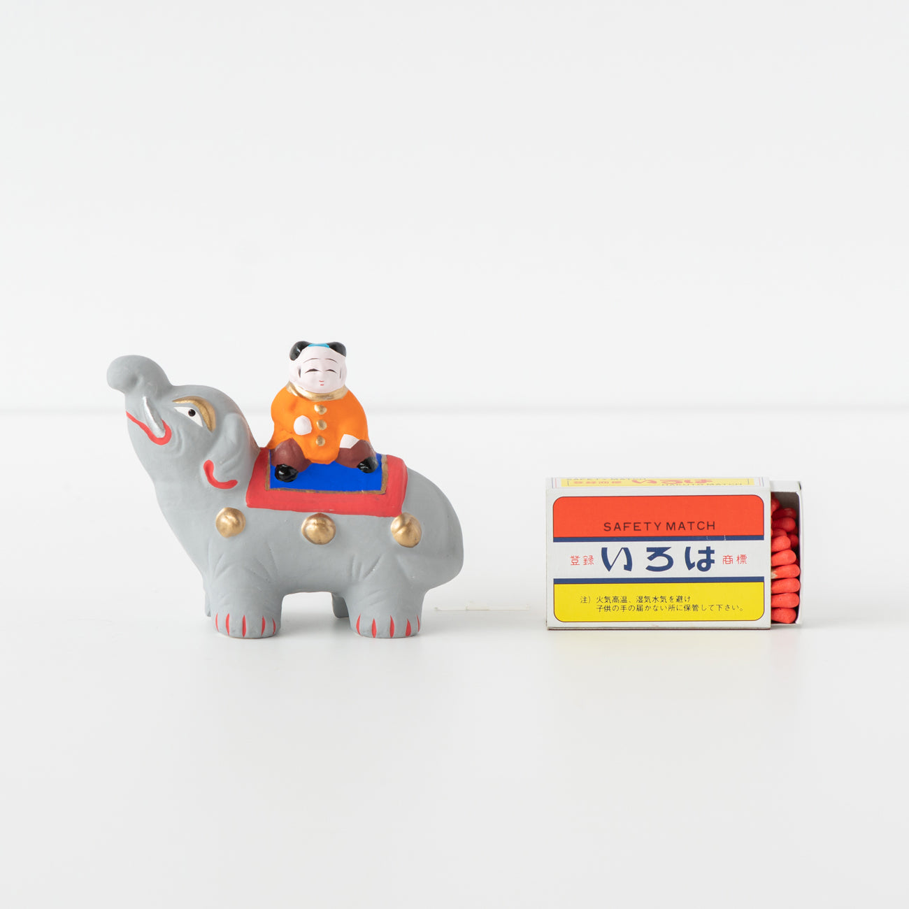 伏見人形 象のり唐子（小） | 京都の伝統工芸品の通販サイト – MOCAD